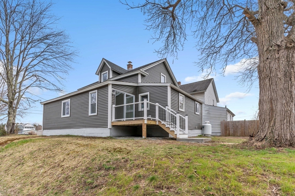 74 Ruggles Street Three Rivers, MA 01080 - Photo 38 of 42 a front view of a house with a yard