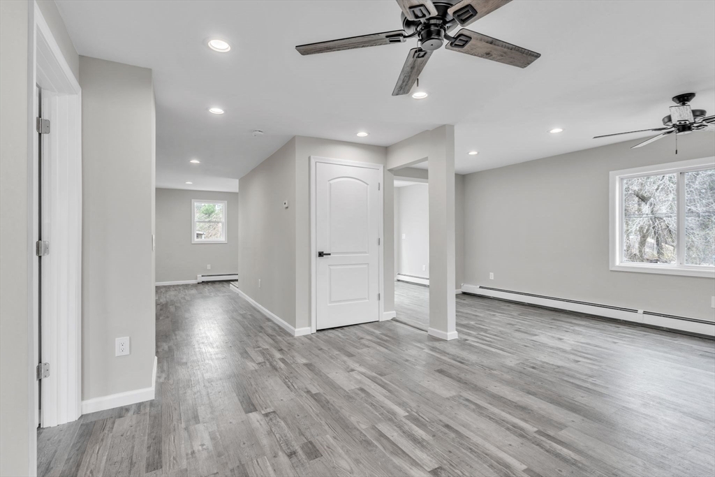 74 Ruggles Street Three Rivers, MA 01080 - Photo 9 of 42 a view of an empty room and wooden floor