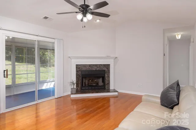 a bedroom with a bed and a fireplace