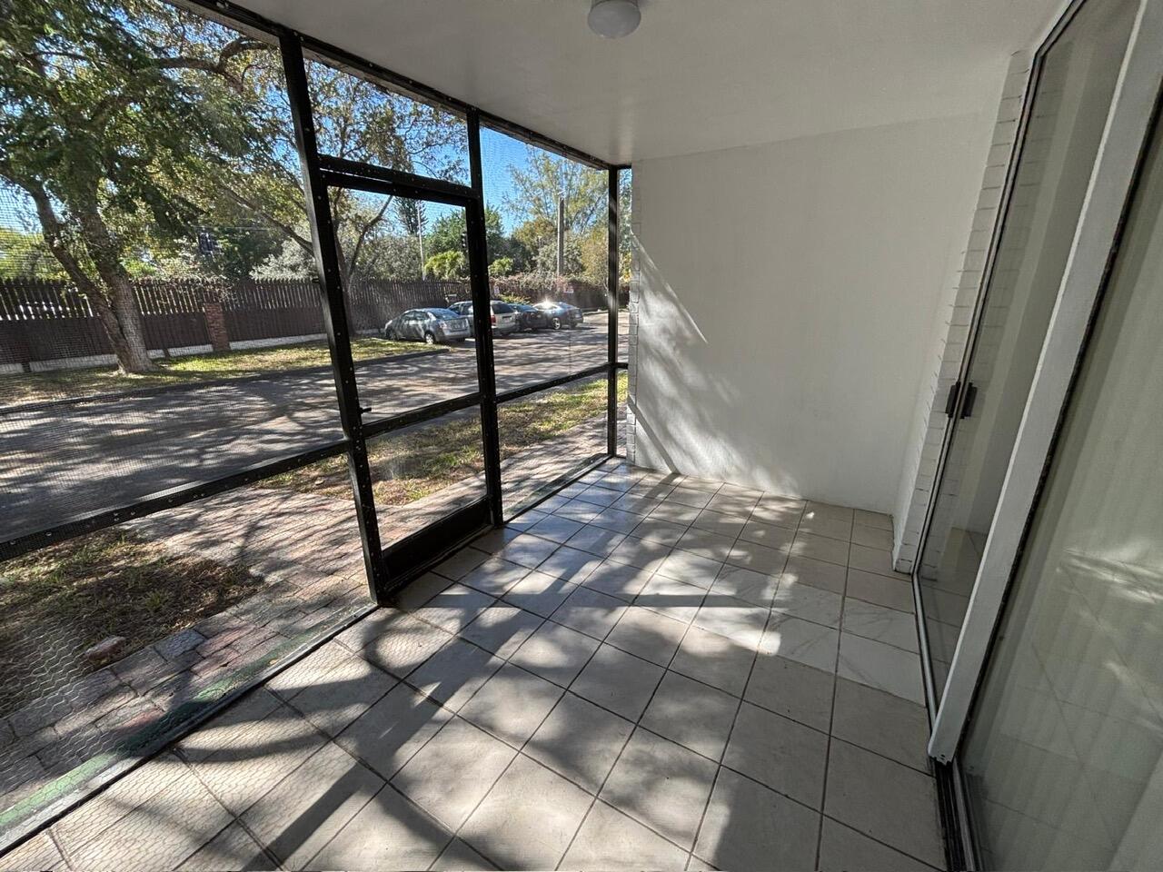 3650 Inverrary Drive, Unit 1K Lauderhill, FL 33319 - Photo 12 of 13 a view of outdoor space with seating