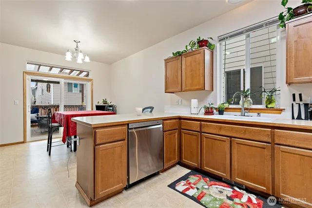 a kitchen with a sink and cabinets