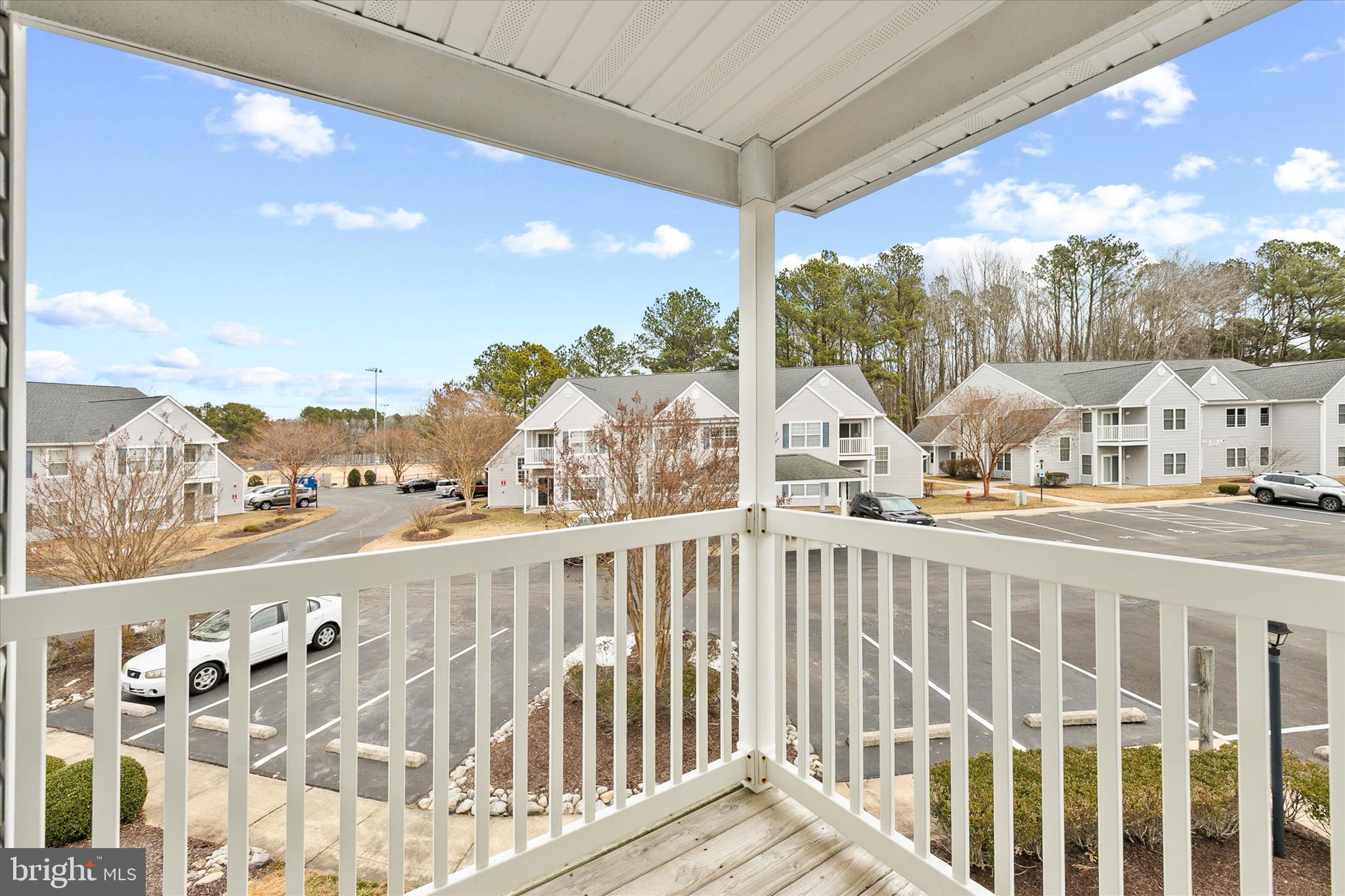 11423 Manklin Creek Road, Unit 1 Ocean Pines, MD 21811 - Photo 29 of 40 a view of city from a balcony