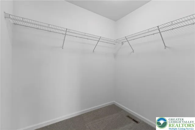 a view of a room with racks on the wall