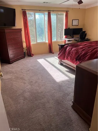 a view of a hardwood floor and wardrobe
