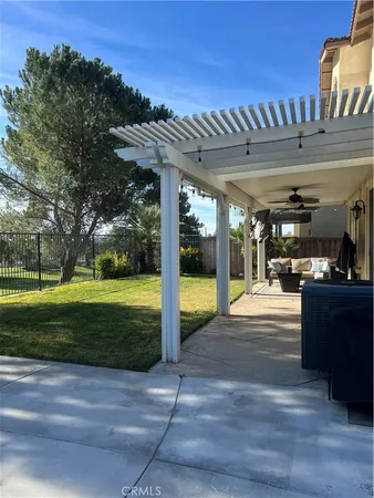 a view of a porch and garden