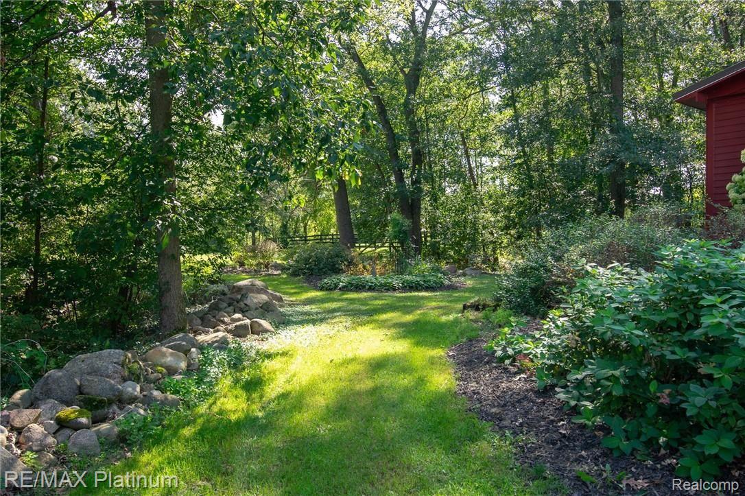 12214 Foley Road Fenton, MI 48430 - Photo 20 of 40 path around front.jpg