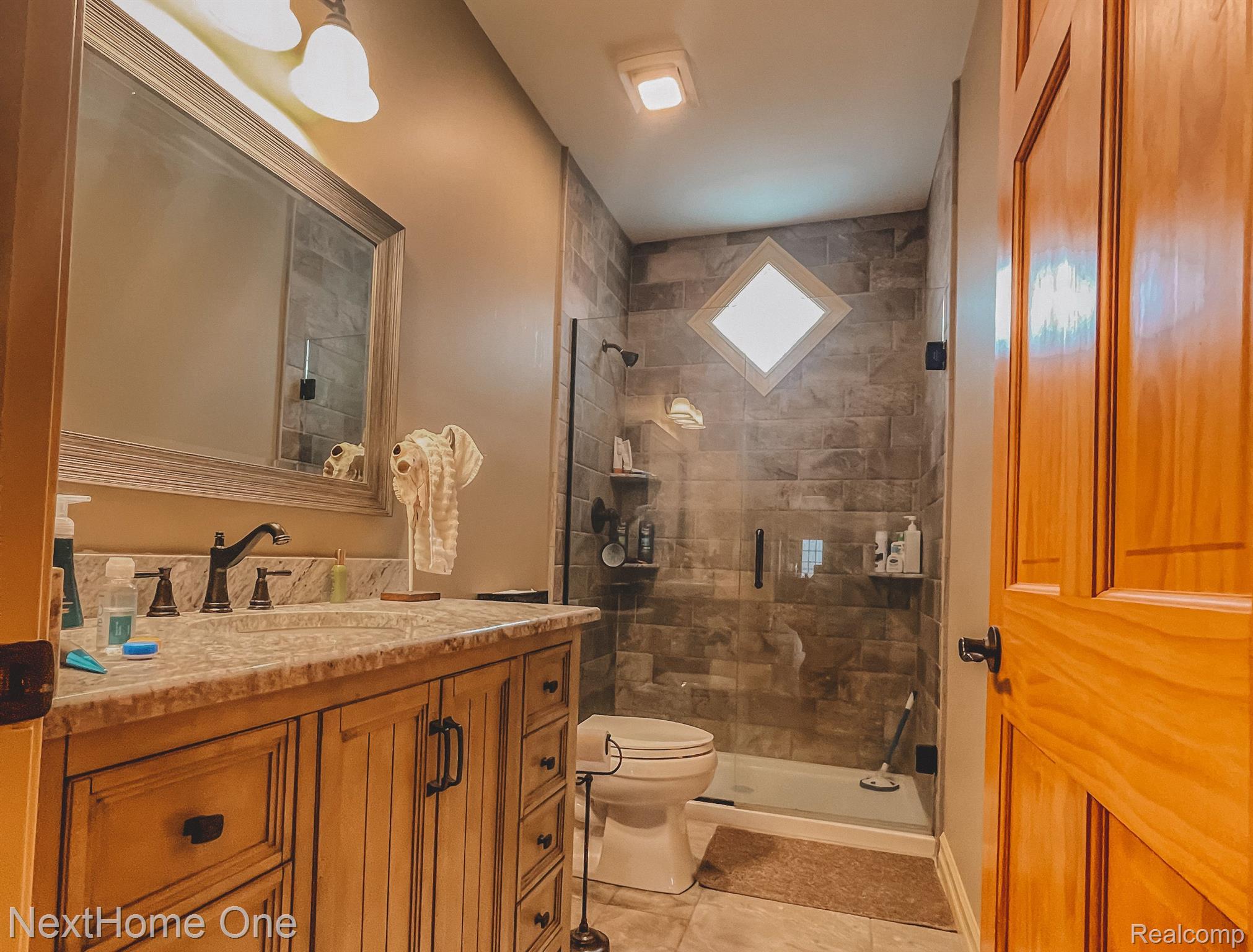 3455 West Coon Lake Road Howell, MI 48843 - Photo 23 of 49 Shared Bathroom