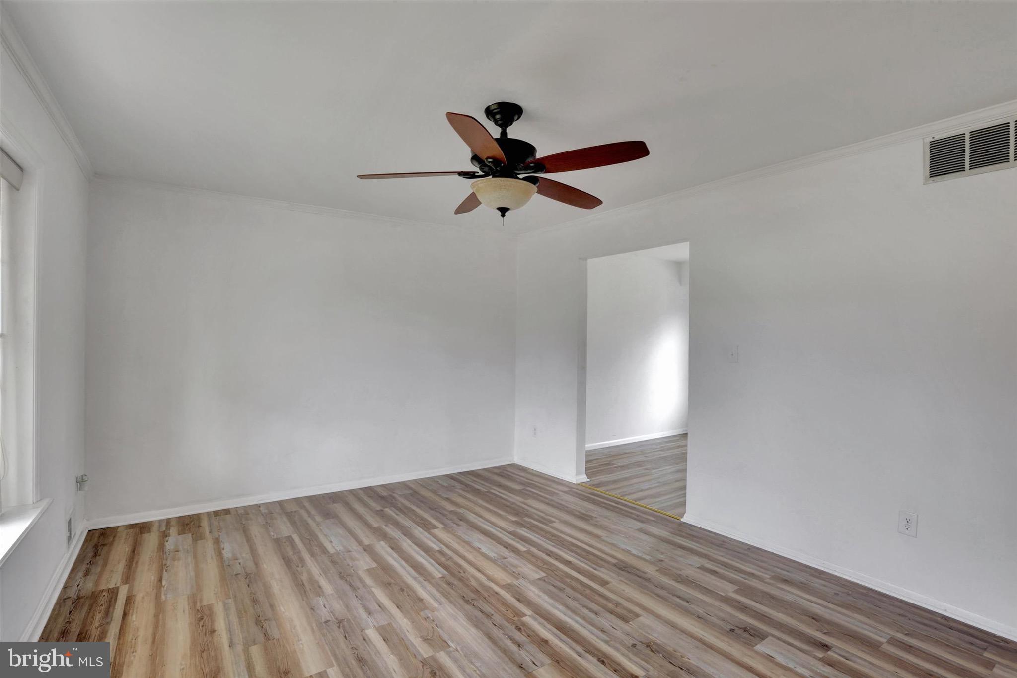 80 Dover Road Westampton, NJ 08060 - Photo 16 of 36 a view of empty room with wooden floor