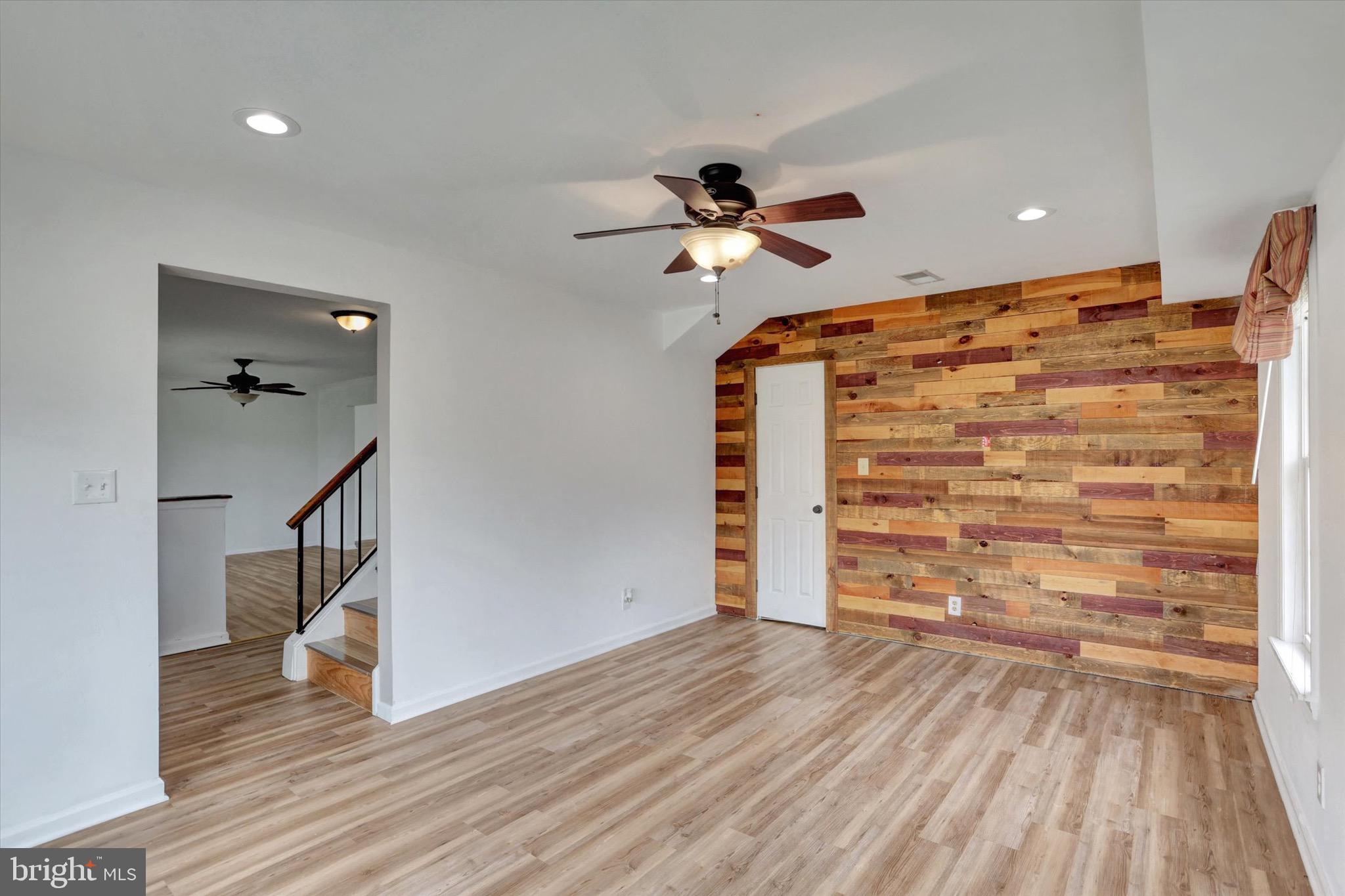 80 Dover Road Westampton, NJ 08060 - Photo 19 of 36 a view of empty room with wooden floor and fan