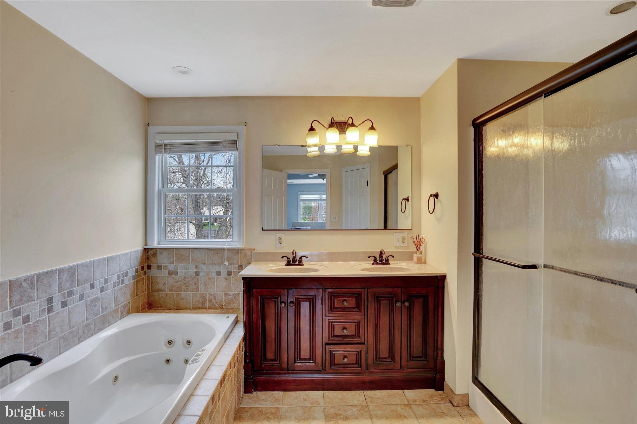 80 Dover Road Westampton, NJ 08060 - Photo 26 of 36 a spacious bathroom with a tub sink and mirror