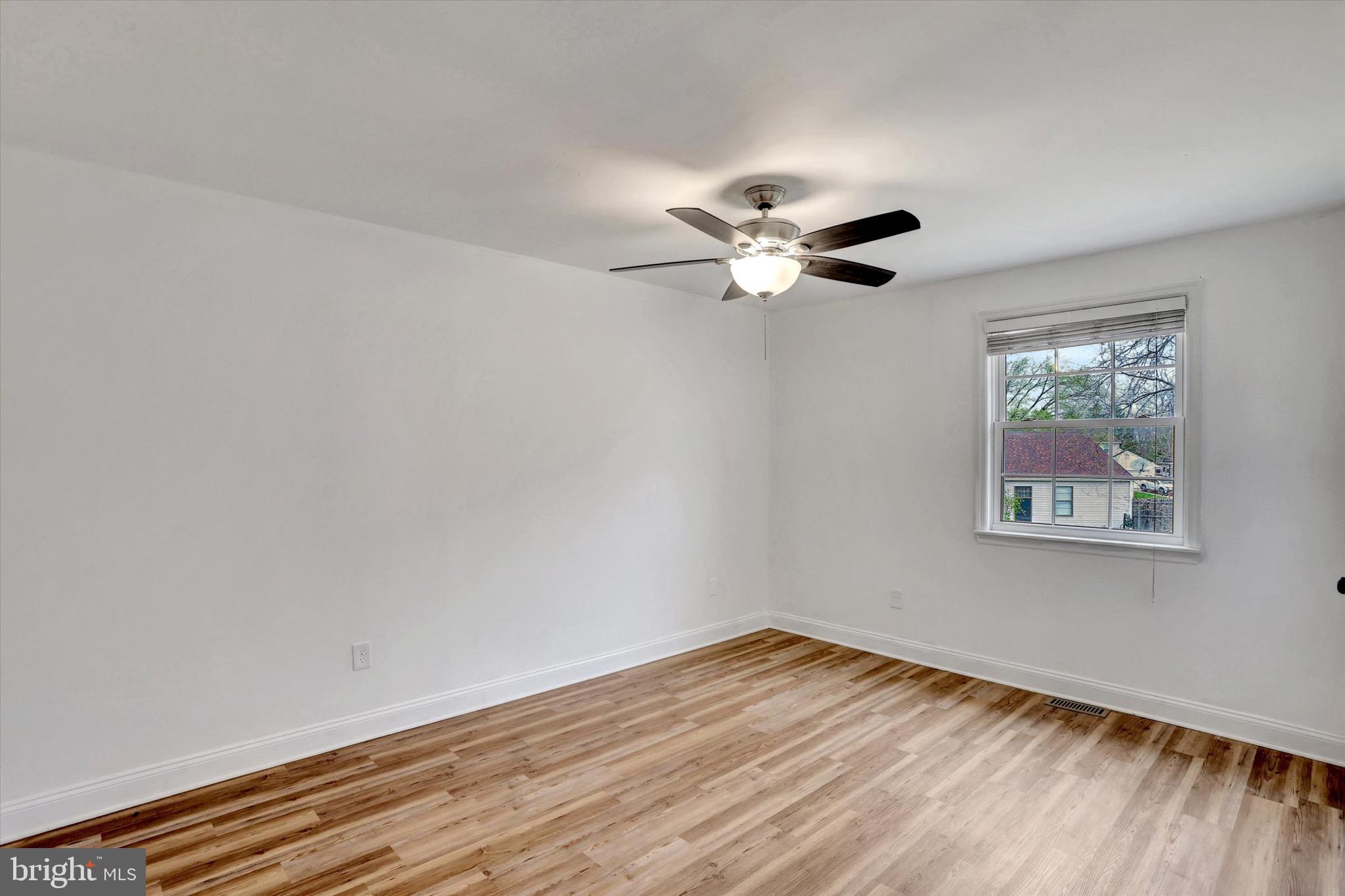 80 Dover Road Westampton, NJ 08060 - Photo 29 of 36 a view of a room with wooden floor and a ceiling fan