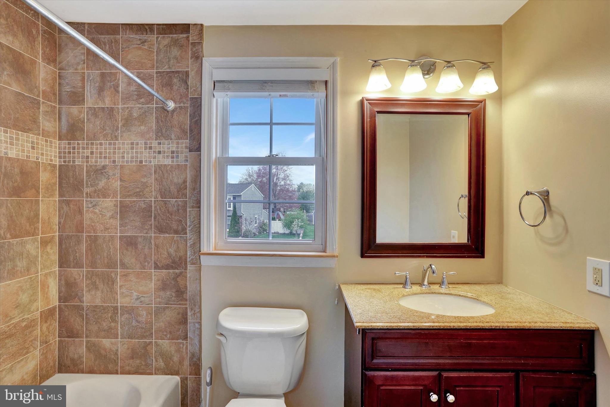 80 Dover Road Westampton, NJ 08060 - Photo 30 of 36 a bathroom with a toilet sink and mirror