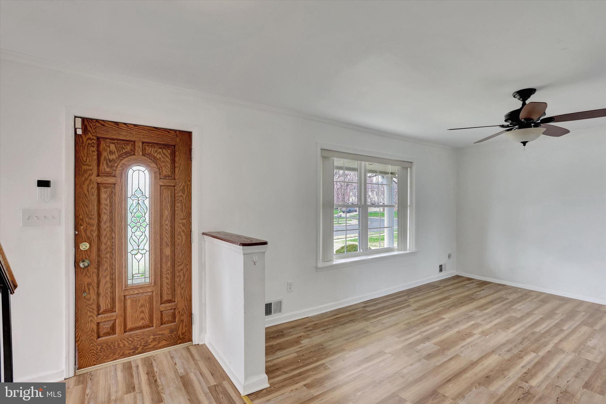 80 Dover Road Westampton, NJ 08060 - Photo 4 of 36 a view of empty room with wooden floor and fan