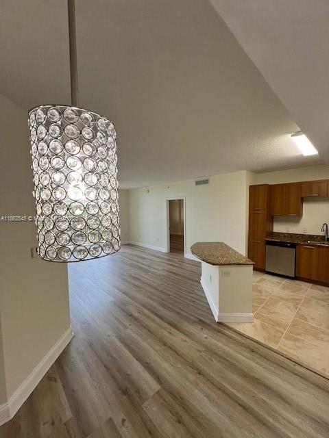 510 Northwest 84th Avenue, Unit 507 Plantation, FL 33324 - Photo 12 of 33 a view of an empty room and wooden floor