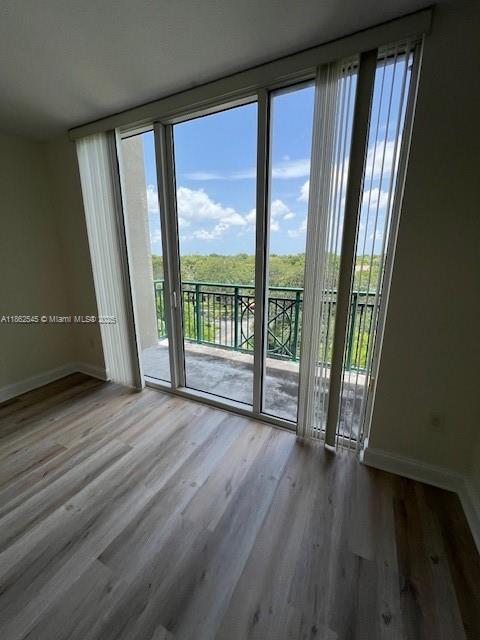 510 Northwest 84th Avenue, Unit 507 Plantation, FL 33324 - Photo 18 of 33 a view of entryway with wooden floor