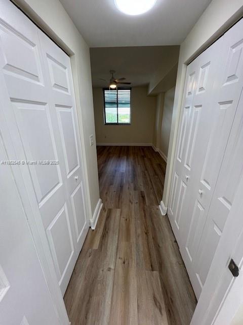 510 Northwest 84th Avenue, Unit 507 Plantation, FL 33324 - Photo 21 of 33 a view of a hallway with wooden floor and staircase