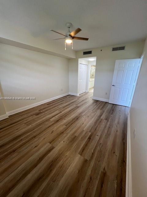 510 Northwest 84th Avenue, Unit 507 Plantation, FL 33324 - Photo 22 of 33 wooden floor in an empty room with a window