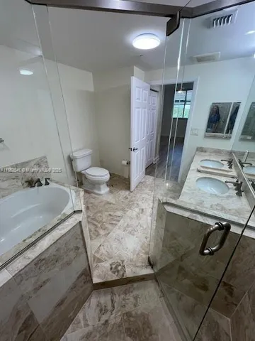 a view of a kitchen cabinets