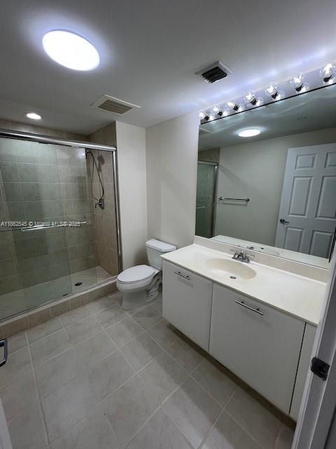 510 Northwest 84th Avenue, Unit 507 Plantation, FL 33324 - Photo 32 of 33 a bathroom with a double vanity sink mirror and toilet