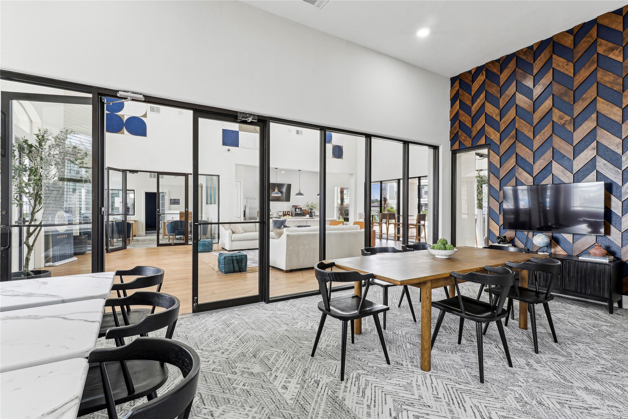 14807 Woodland Hills Drive, Unit 3309 Humble, TX 77396 - Photo 18 of 19 a dining room with furniture and wooden floor