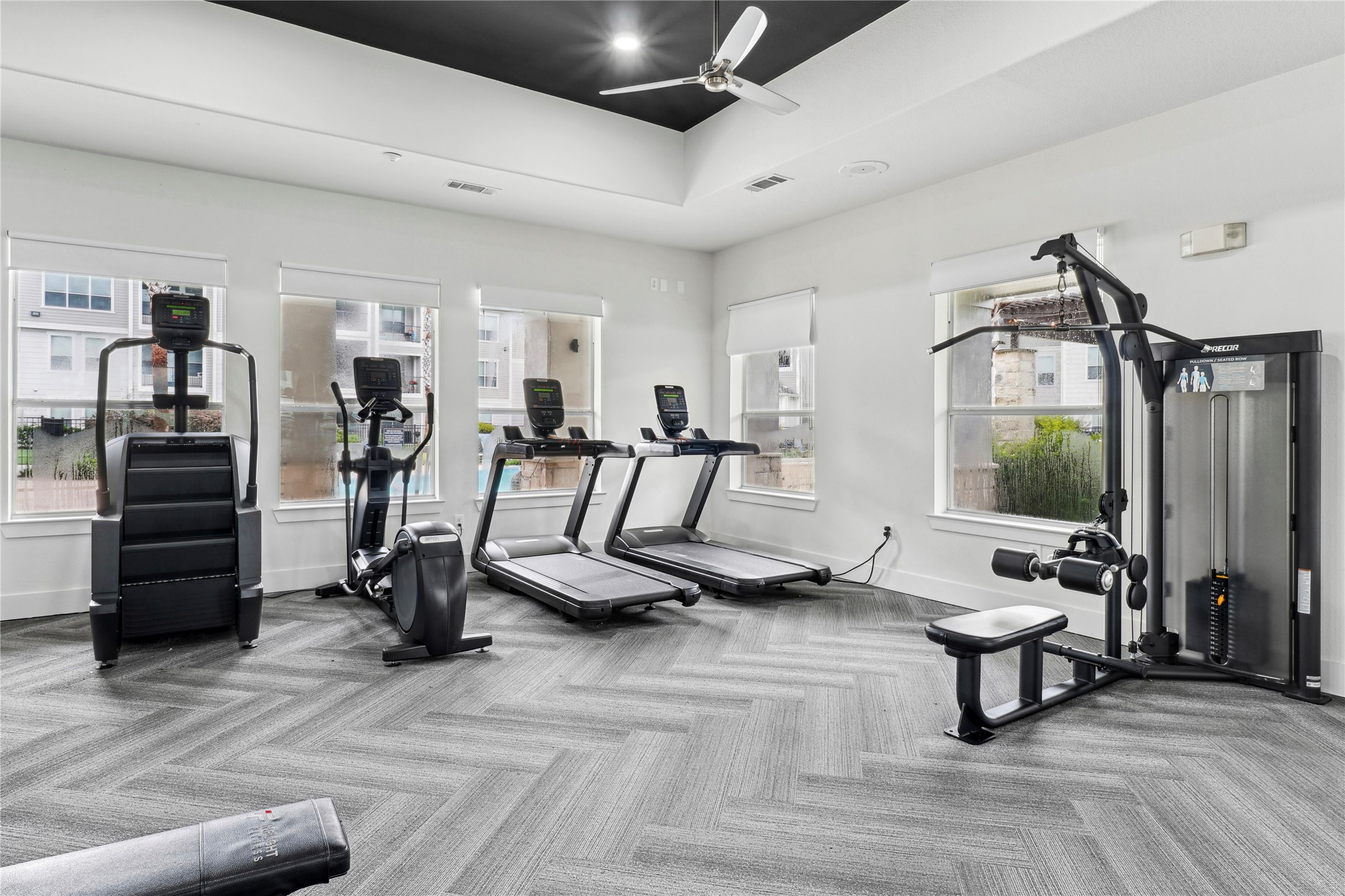 14807 Woodland Hills Drive, Unit 3309 Humble, TX 77396 - Photo 4 of 19 a living room with furniture and a flat screen tv