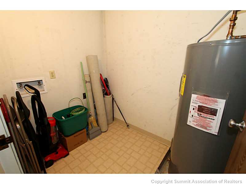 860 Copper Road, Unit 210&A Frisco, CO 80443 - Photo 12 of 17 Other. Large storage closet along with the hot water heater. You can see the washer /dryer hook-ups along the wall.