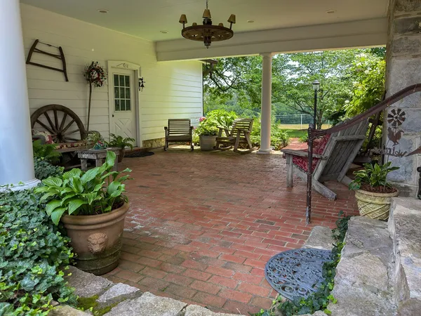 a house view with a garden space