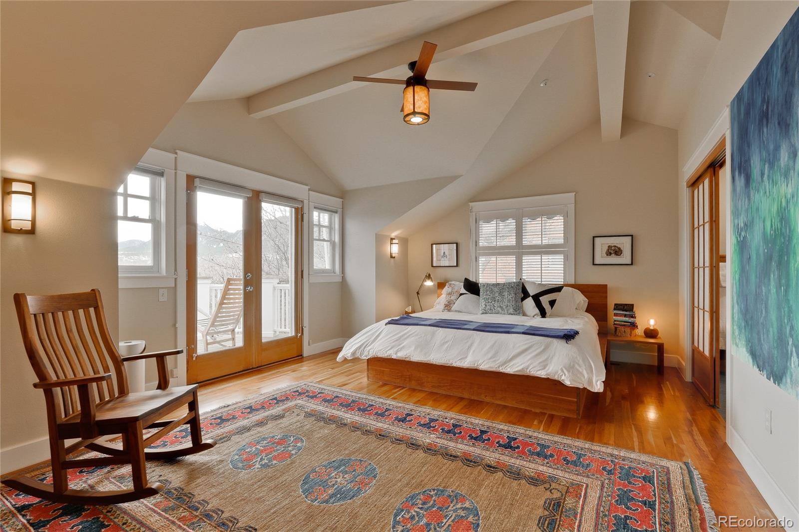 2220 Mesa Drive Boulder, CO 80304 - Photo 16 of 40 a bed sitting in a spacious bedroom next to a window