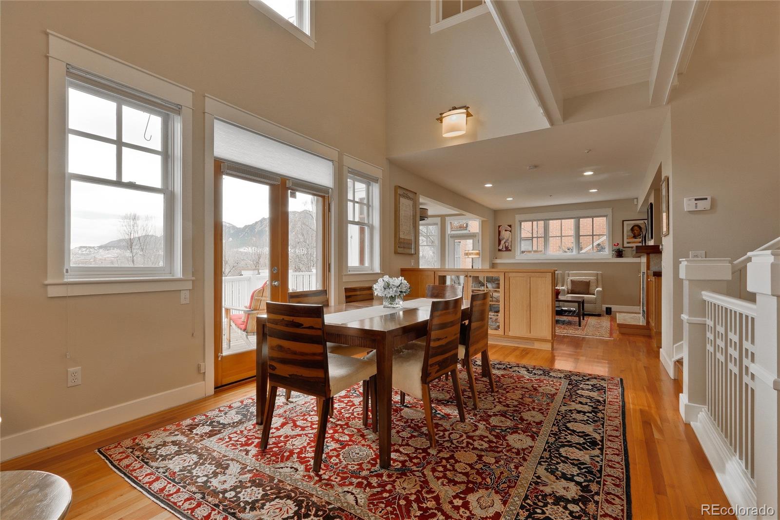 2220 Mesa Drive Boulder, CO 80304 - Photo 9 of 40 a view of a dining room with furniture window and wooden floor