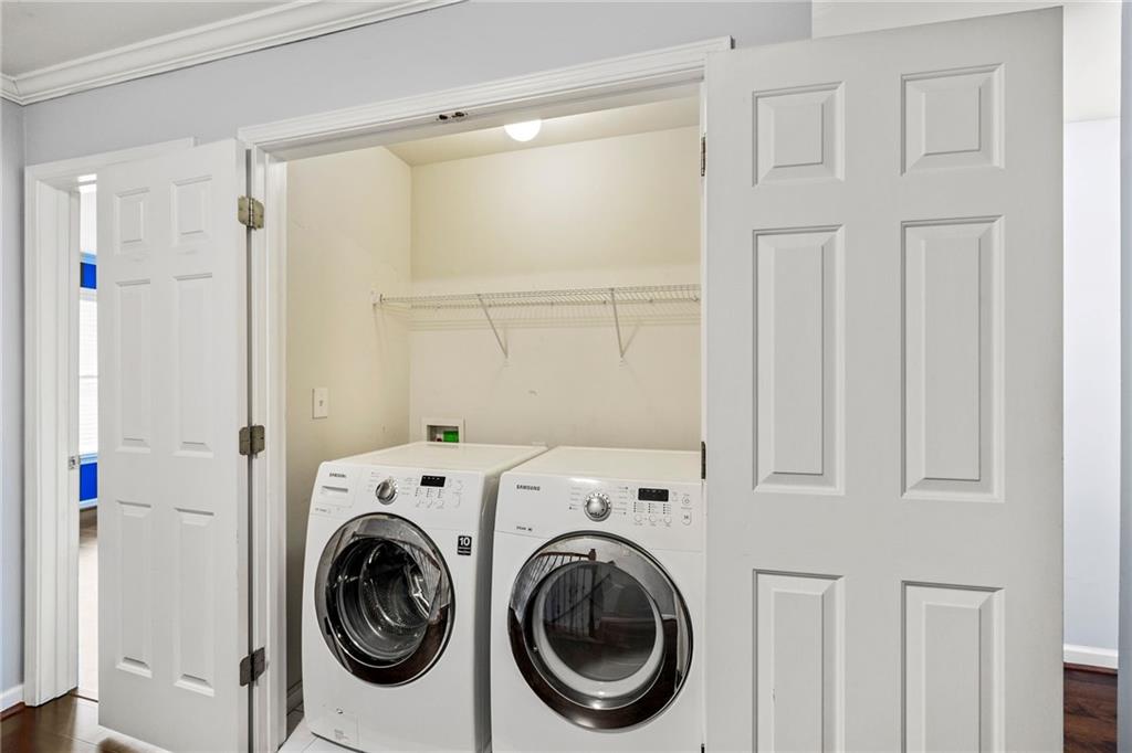 5323 Sherwin Drive Norcross, GA 30093 - Photo 12 of 20 a view of a hallway with washer and dryer