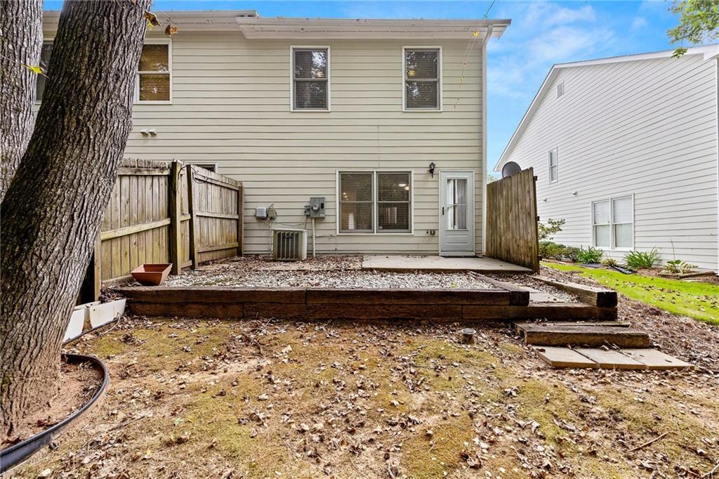5323 Sherwin Drive Norcross, GA 30093 - Photo 18 of 20 a front view of a house with a garden