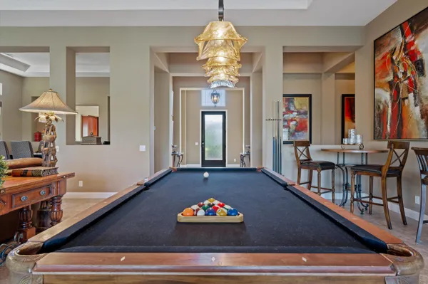 a kitchen with stainless steel appliances granite countertop a stove top oven a sink and dishwasher