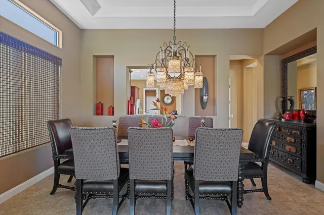 a kitchen with a stove a sink and a refrigerator