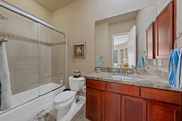 a bedroom with a bed and a closet