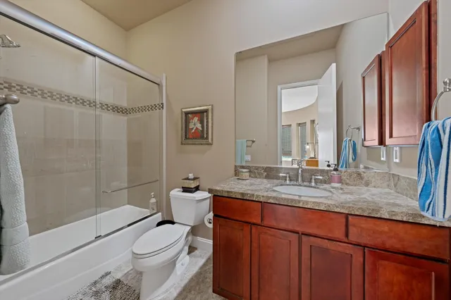 a bedroom with a bed and a closet