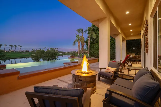 a outdoor living space with furniture and city view