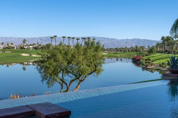 a view of a livingroom with furniture and window