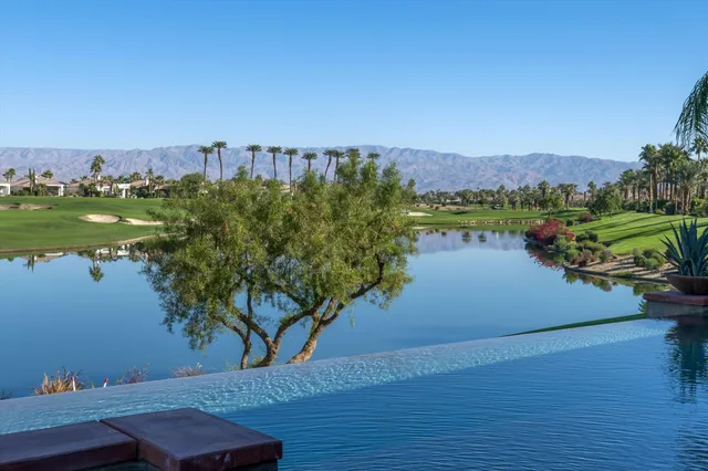 a view of a livingroom with furniture and window