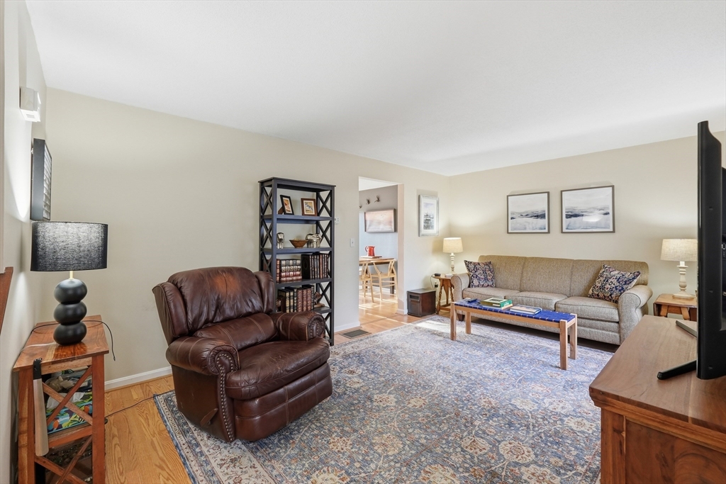 202 Torrey Ln Extension, Unit 202 Holden, MA 01520 - Photo 5 of 32 a living room with furniture and a couch