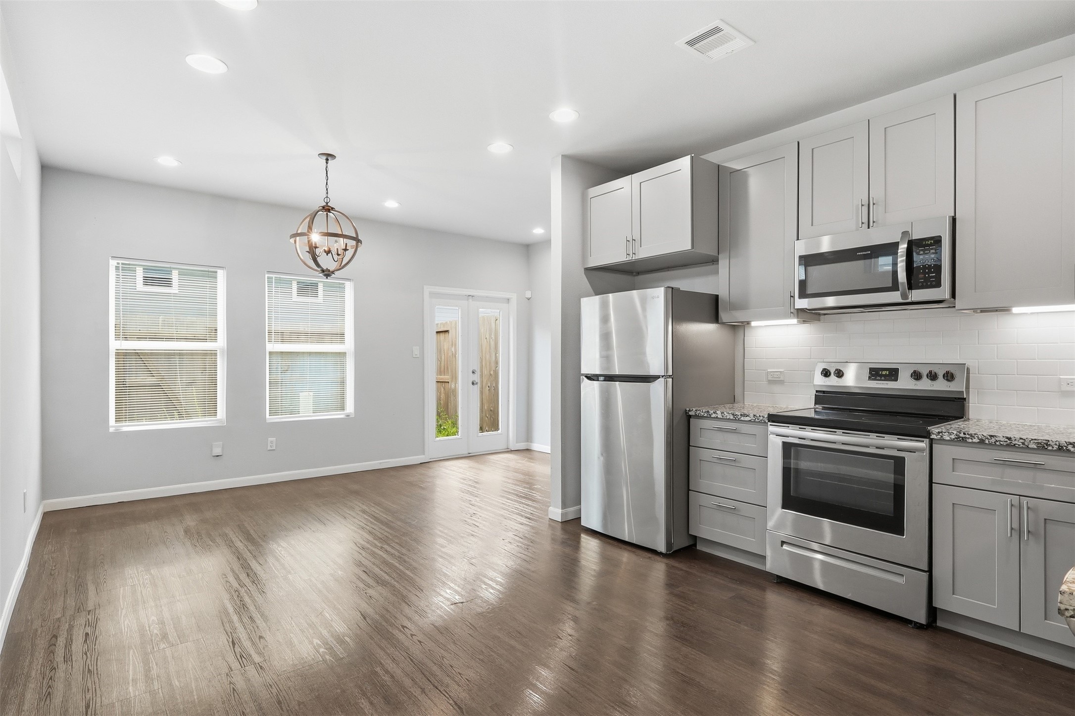 4937 Ambient Dr Spring Spring, TX 77379 - Photo 3 of 16 Kitchen and Dining area