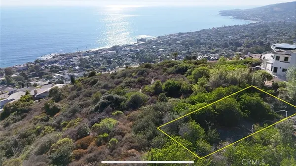 an aerial view of beach and ocean