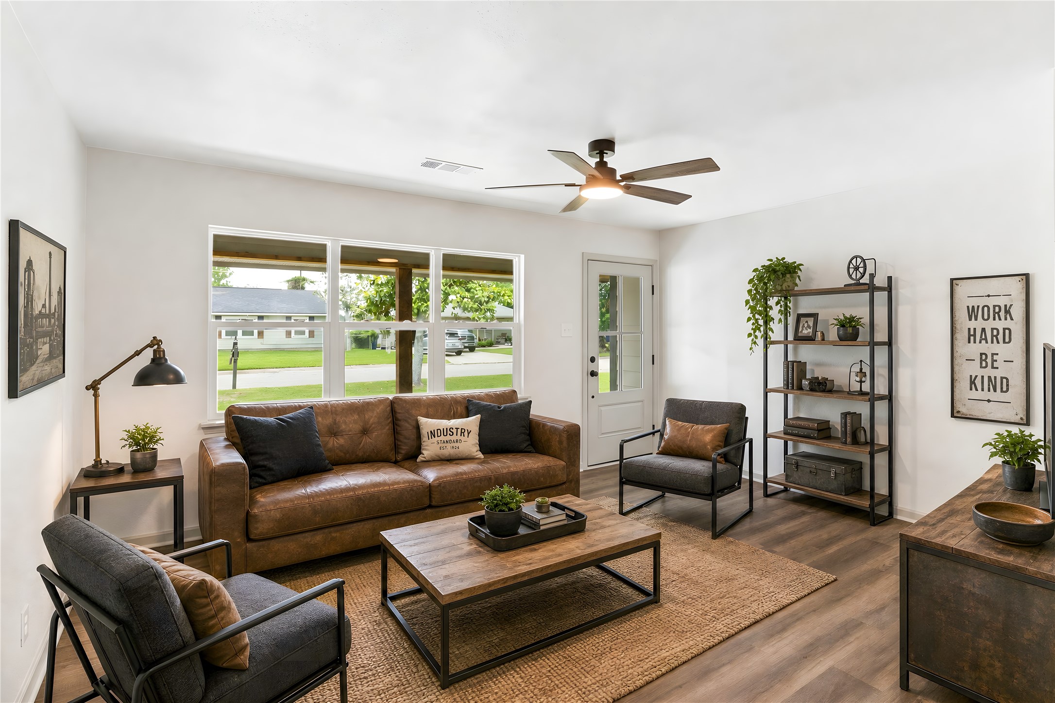 1108 Nottingham Drive Angleton, TX 77515 - Photo 5 of 23 a living room with furniture and a large window