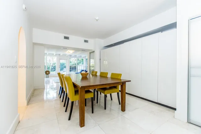 a view of an empty room with a balcony