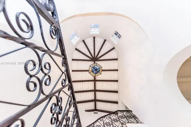 a kitchen with stainless steel appliances a stove a sink and a refrigerator