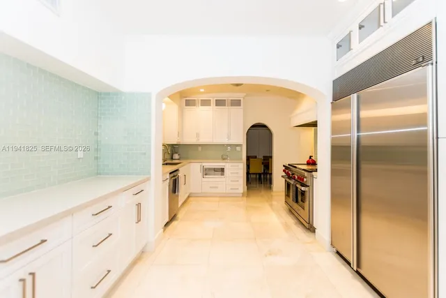 a view of a room with a large parking space and windows