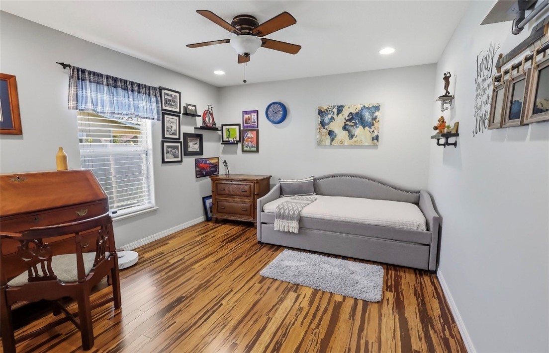 1771 Mistletoe Street Sebastian, FL 32958 - Photo 26 of 36 a living room with furniture and a wooden floor