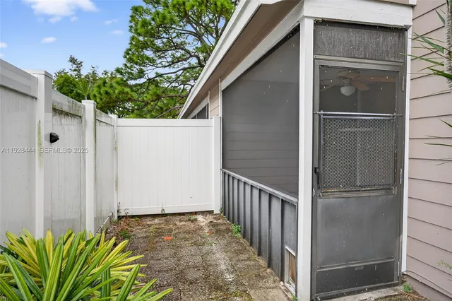 a view of a lake with houses in the back