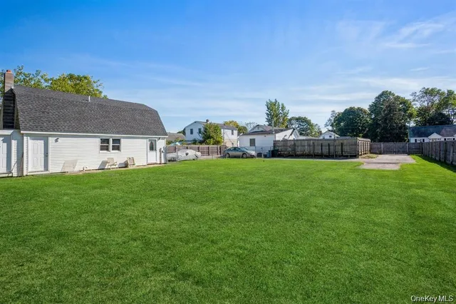 a view of a house with a back yard