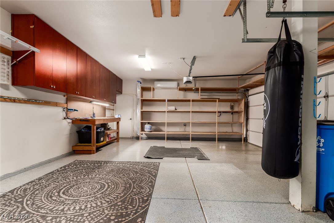 264 Pointe Ranier Avenue Henderson, NV 89012 - Photo 40 of 47 Garage featuring baseboards