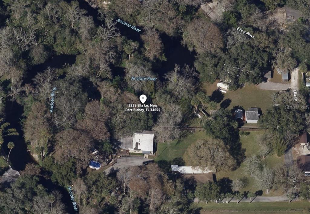 an aerial view of house with outdoor space